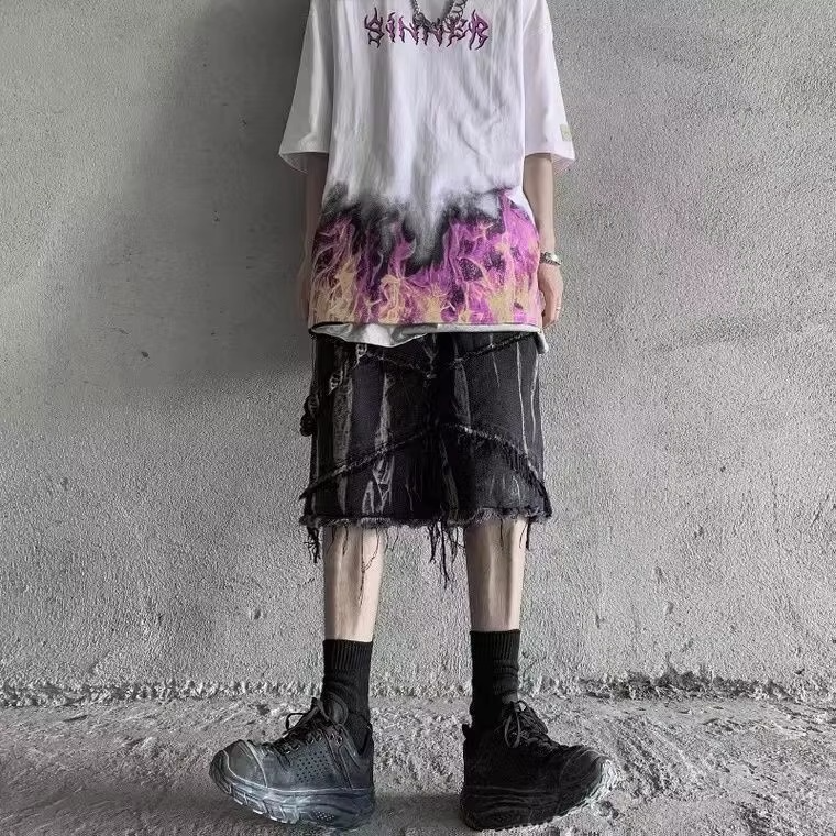 Diagonal Panel Fringe Shorts